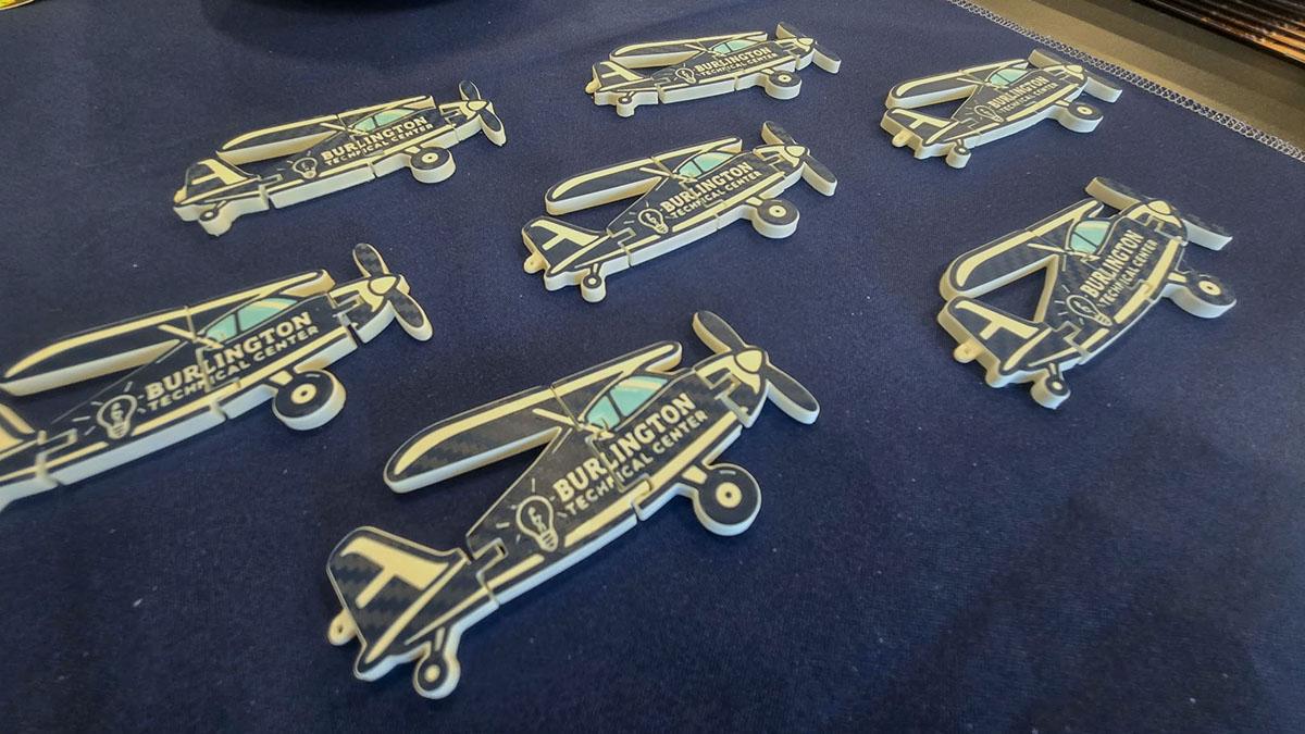 Close-up of Burlington Technical Center airplane-shaped printed pieces
